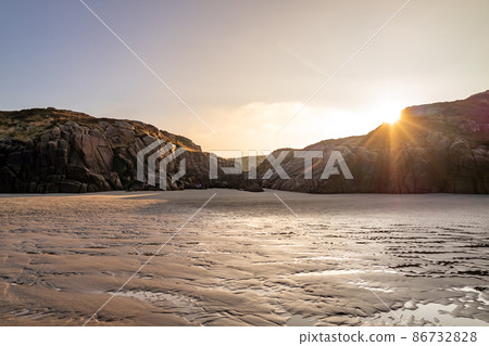 The beautiful Cloughglass bay and beach by Burtonport in County Donegal - Ireland 86732828
