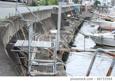 Fishing boats parked at Himeji Port Fishing boats parked at Himeji Port 86733564