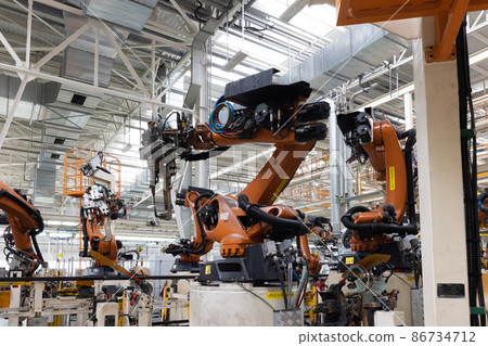 Photo of automobile production line. Welding car body. Modern car assembly plant. Auto industry 86734712