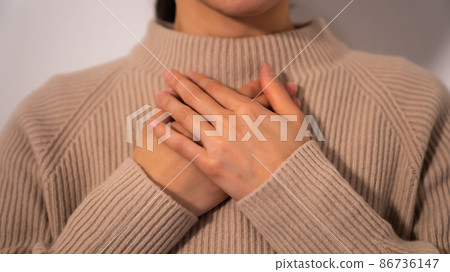 Young woman praying desperately 86736147