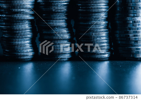 Pile of gold coins money stack in finance treasury deposit bank account saving 86737314