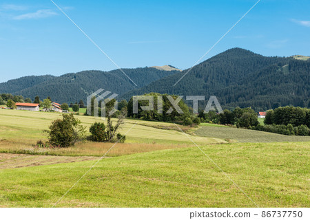 Scenic view over the German countryside around the village Bad Kohlgrub, Bavaria. 86737750
