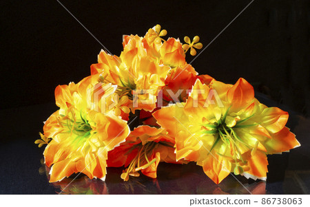 Artificial flowers.Beautiful and bright background close-up. Artificial flowers.Beautiful and bright background close-up. 86738063