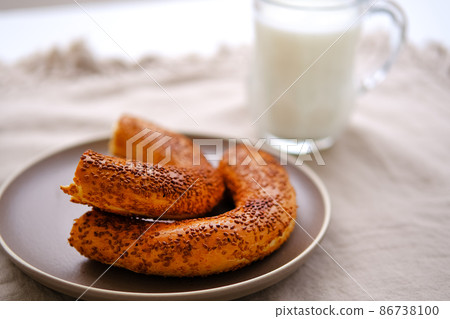 Traditional Turkish bagel pastry simit ,gevrek and fermented beverage ayran. 86738100