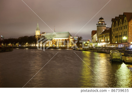 Cathedral and Fish Village. Night view. Kaliningrad. Russia Cathedral and Fish Village. Night view. Kaliningrad. Russia 86739635