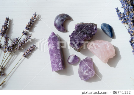 Healing crystals on brown background 86741132