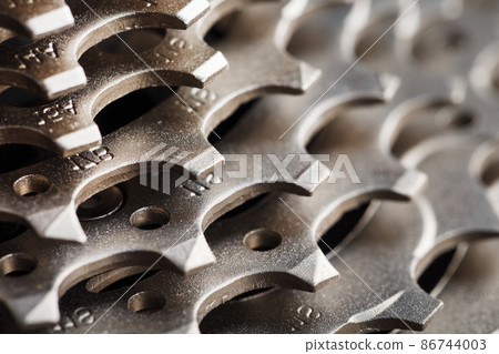 Bicycle road cassette close-up on a black background 86744003