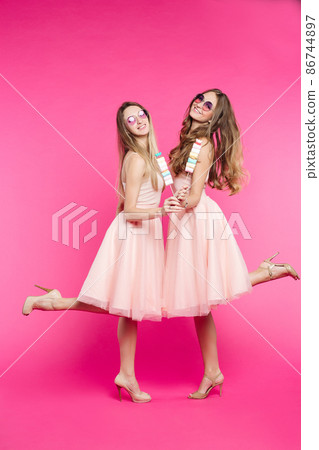 Beautiful and stylish girls with marshmallow 86744897