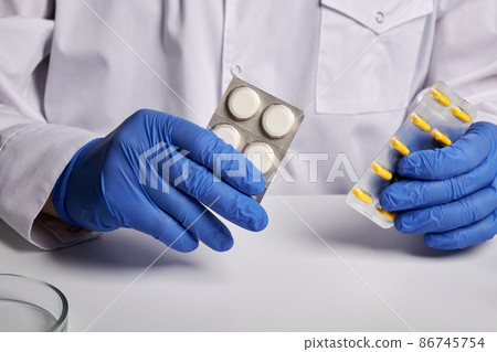 Doctor Shows Remedy Blisters - Labs Photo Doctor Shows Remedy Blisters - Labs Photo 86745754