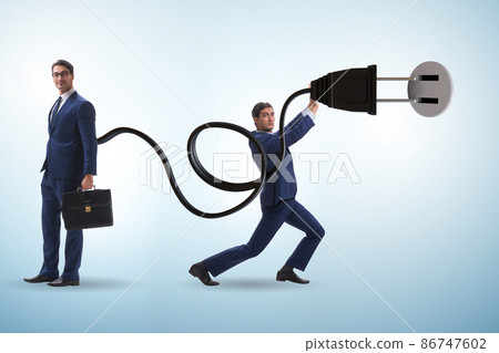 Businessman being powered by electric power 86747602