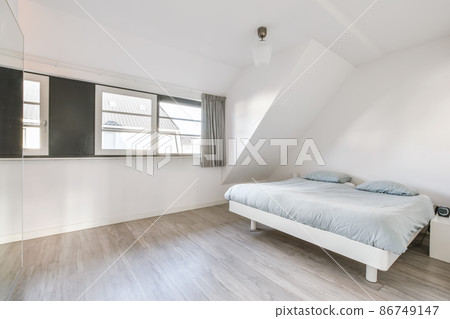 Beautiful bedroom in new luxury home with some decor 86749147