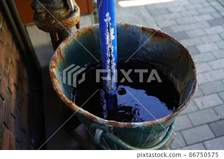 Hot spring well at the storefront Hot spring well at the storefront 86750575