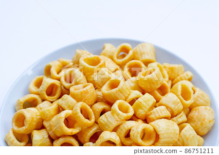 Crispy potato rings on white background. Crispy potato rings on white background. 86751211