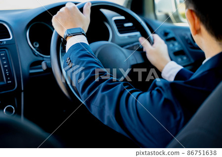 Businessman driving 86751638