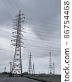 Large towers arranged for complex transmission line wiring 86754468