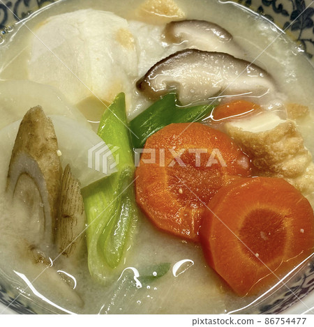 Zoni made with brightly colored miso Zoni made with brightly colored miso 86754477