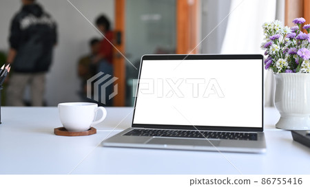 Cropped shot businesswoman holding pen and writing information on notebook. Cropped shot businesswoman holding pen and writing information on notebook. 86755416