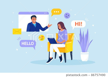 Woman is sitting on armchair and using laptop for video call with boy friend or colleague. Friends talking online. Online education and e-learning. Social media or Dating app and virtual relationship 86757490