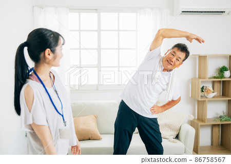 Elderly men and women measuring physical fitness (radio calisthenics) 86758567