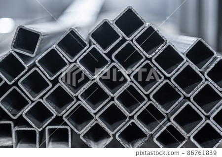 Steel tube, square high carbon metal tube for construction site. Metallurgy background 86761839