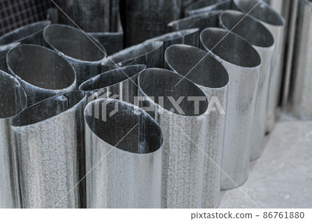 Group of round metal pipes profiles calibers for construction structures. Metallurgy background 86761880