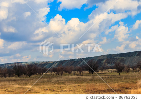 View of slag heaps of iron ore quarry. Mining industry 86762053