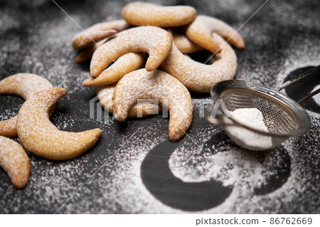 Plate of Traditional German or Austrian Vanillekipferl vanilla kipferl cookies Plate of Traditional German or Austrian Vanillekipferl vanilla kipferl cookies 86762669