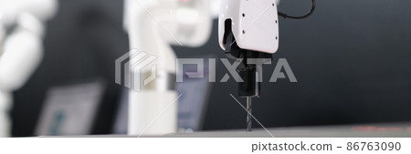 Robot arm automatic drilling machine at industrial production plant Robot arm automatic drilling machine at industrial production plant 86763090