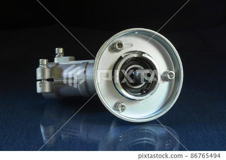 Trimmer reducer on a glass table with reflection 86765494