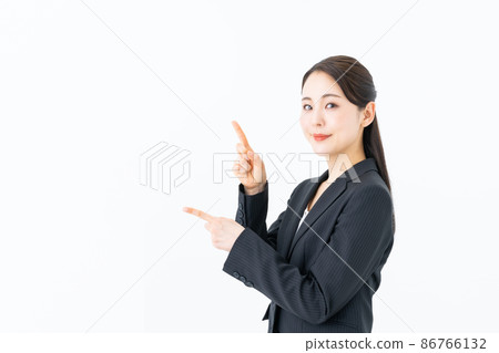 Young business woman with a white background Young business woman with a white background 86766132