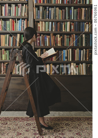 Woman in the library Woman in the library 86766961