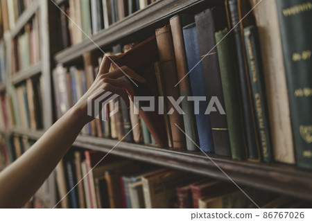 A woman in the library 86767026