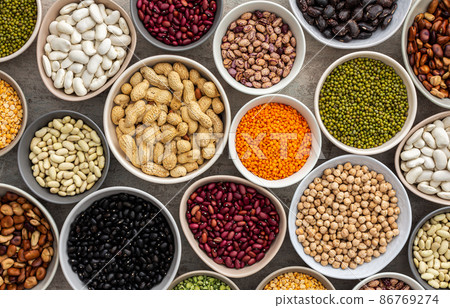 Different types of legumes in bowls 86769274