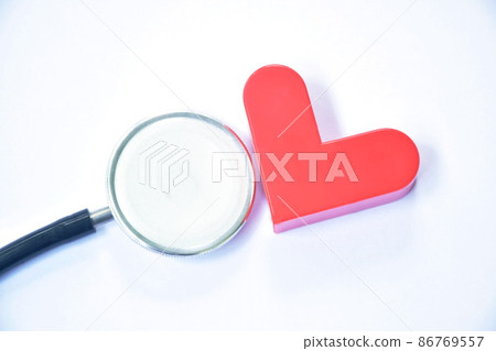 red heart and stethoscope medical equipment for doctor listening pulse of patient on white background 86769557