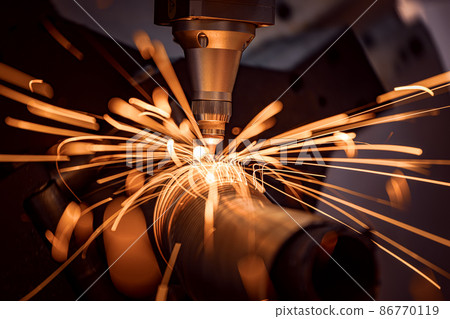 CNC Laser cutting of metal, modern industrial technology. 86770119