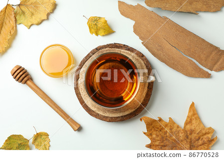 Cozy autumn concept background with tea drink Cozy autumn concept background with tea drink 86770528