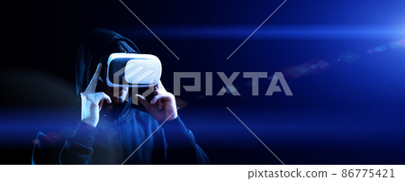 Vr goggles virtual reality. Young man in digital helmet for 3d virtual reality game on dark background. Study and virtual world in 3D simulation. Vr goggles virtual reality. Young man in digital helmet for 3d virtual reality game on dark background. Study and virtual world in 3D simulation. 86775421