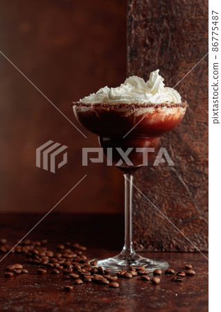 Coffee and chocolate cocktail with whipped cream. Coffee and chocolate cocktail with whipped cream. 86775487