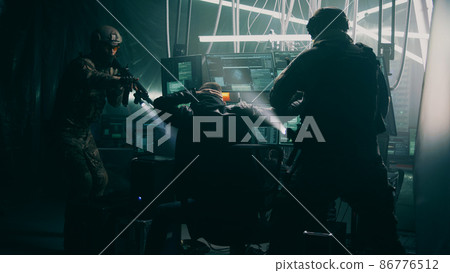 Police tactical unit arresting hackers 86776512