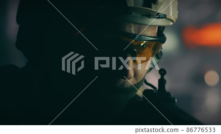 Policeman talking to arrested hacker 86776533