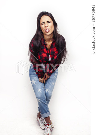 young happy smiling latin american teenage girl emotional posing isolated on white background, lifestyle people concept young happy smiling latin american teenage girl emotional posing isolated on white background, lifestyle people concept 86776942