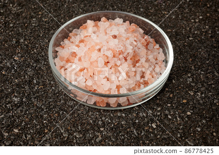 Rose Salt in Petri Dish on Ruberoid Grain Surface Rose Salt in Petri Dish on Ruberoid Grain Surface 86778425
