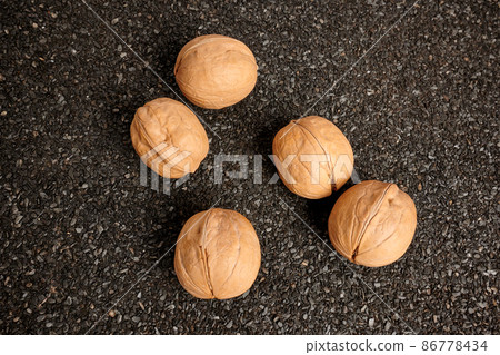 Greek Nuts on Ruberoid Grain Surface Greek Nuts on Ruberoid Grain Surface 86778434