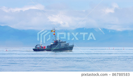 Naval minesweeper in Avacha bay on Kamchatka. Selective focus 86780583