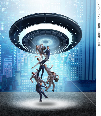 The flying saucer abducting young businessman 86780987