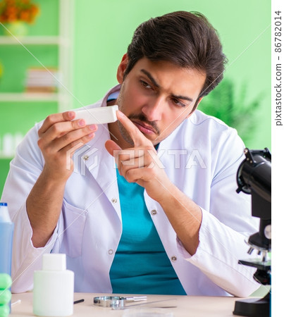 Chemist testing soap in the lab Chemist testing soap in the lab 86782014
