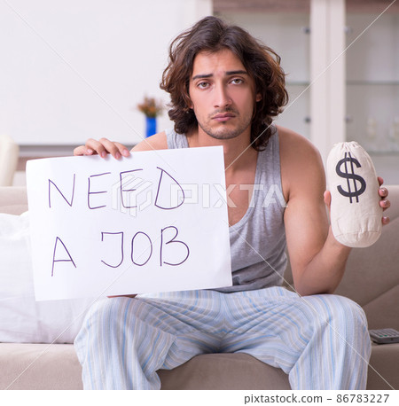Unemployed man desperate at home Unemployed man desperate at home 86783227