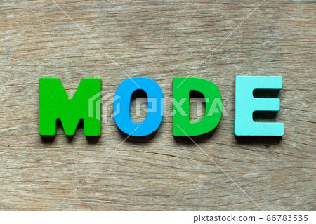 Color alphabet letter in word mode on wood background Color alphabet letter in word mode on wood background 86783535
