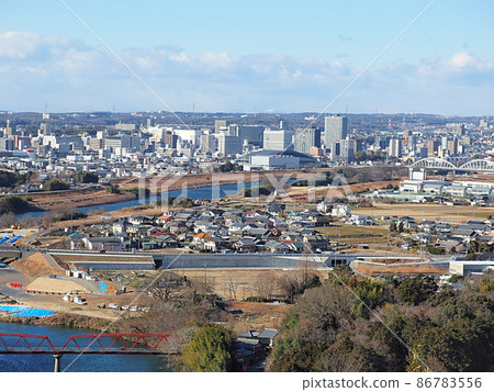 Scenery of Toyota city area and Yahagi river seen from Nomiyama observatory Scenery of Toyota city area and Yahagi river seen from Nomiyama observatory 86783556