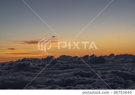The sea of clouds at sunrise seen when climbing Mt. Fuji 86783640